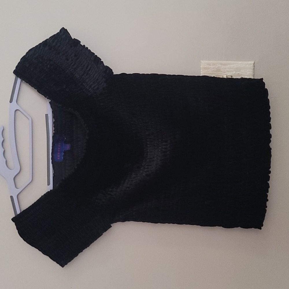 Gently used black top, stretch ,off shoulder